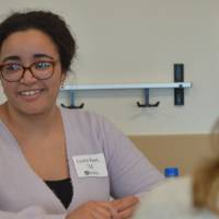 Caylie Peet talking with students at the 30 Minute Mentors Event